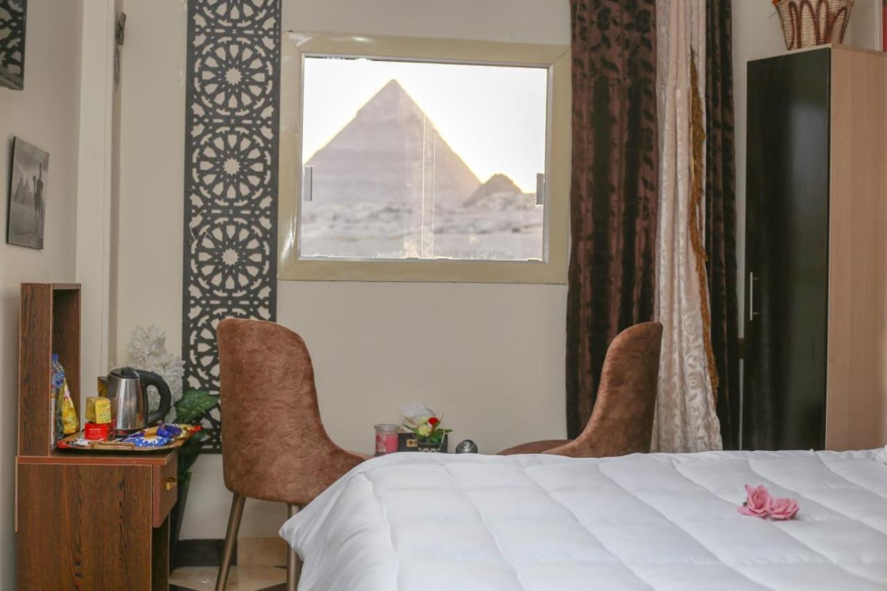 Pyramids Show Hotel Kafret el-Gabal Buitenkant foto