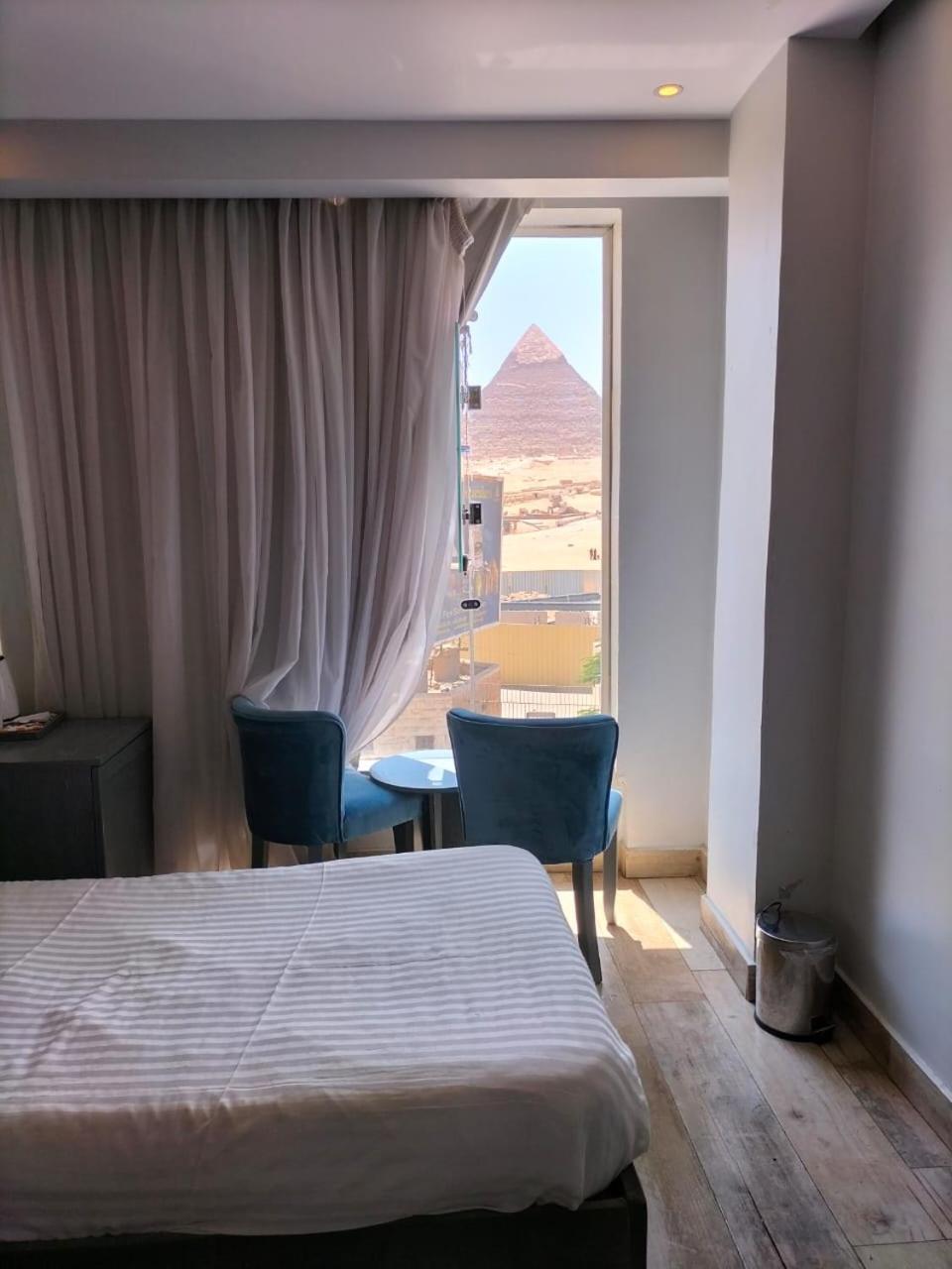 Pyramids Show Hotel Kafret el-Gabal Buitenkant foto